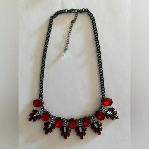 Red jewel necklace.